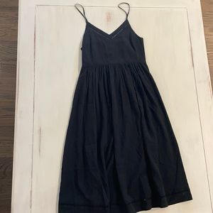 Black mid-length sundress.